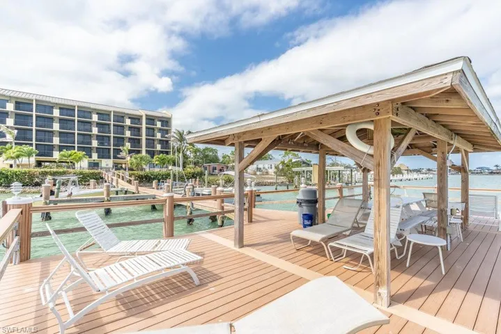 Dock featuring a water view and boat lift