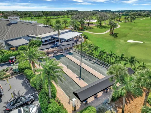 Drone / aerial view of a golf club and a tree filled landscape