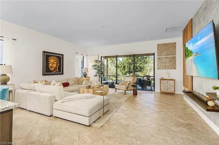 Living area with light tile patterned floors