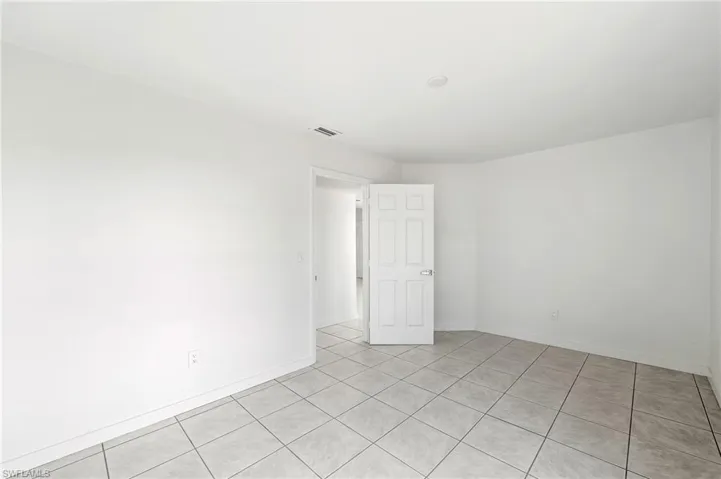 View of tiled spare room