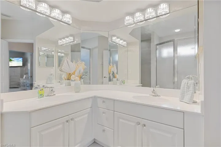 Bathroom with vanity and an enclosed shower