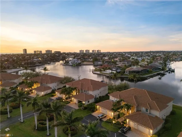 Aerial view at dusk with a water view
