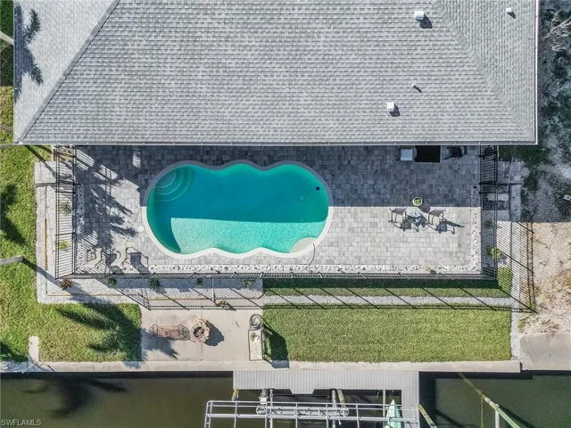Lovely lanai, pool, composite deck and lift area.