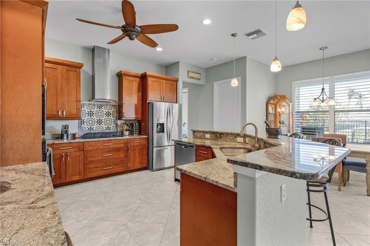 Cherry Cabinets, Stainless appliances, granite counters.