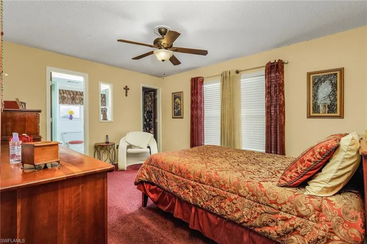 primary bedroom with walk in closet