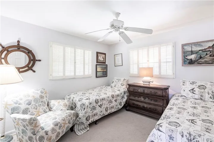 3rd Bedroom featuring ceiling fan and multiple windows, very spacious