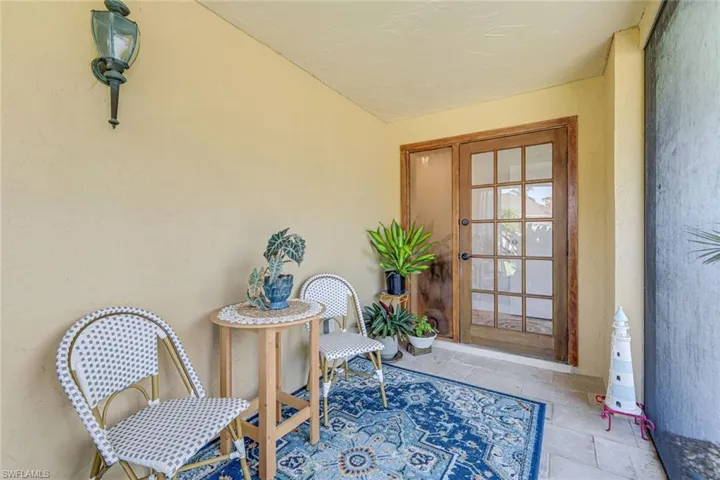 Main entry offers a private lanai, perfect for enjoying the sunset.