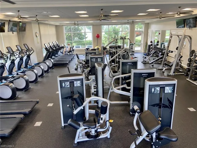 Exercise room featuring ceiling fan