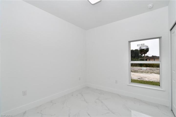 621  Tomasello  DR, Lehigh Acres, FL 33974