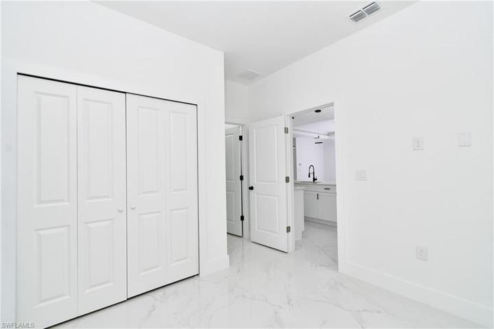 621  Tomasello  DR, Lehigh Acres, FL 33974
