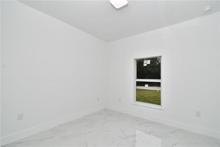 621  Tomasello  DR, Lehigh Acres, FL 33974