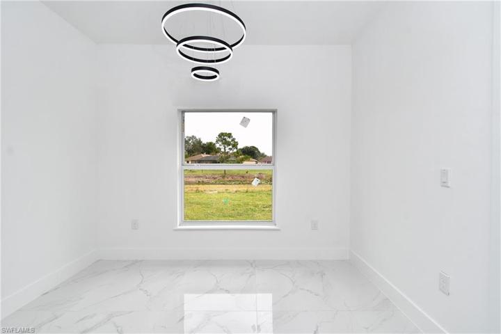 621  Tomasello  DR, Lehigh Acres, FL 33974