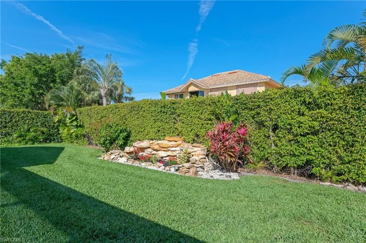 Private Back Yard with lush lawn