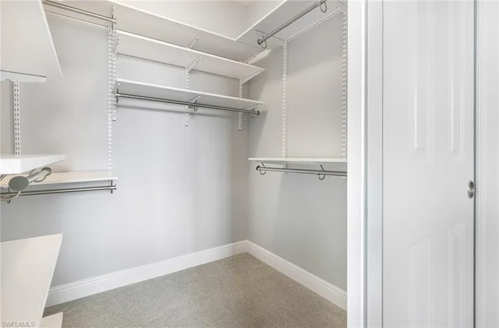 Bedroom #2 Walk in Closet with Custom Closet System
