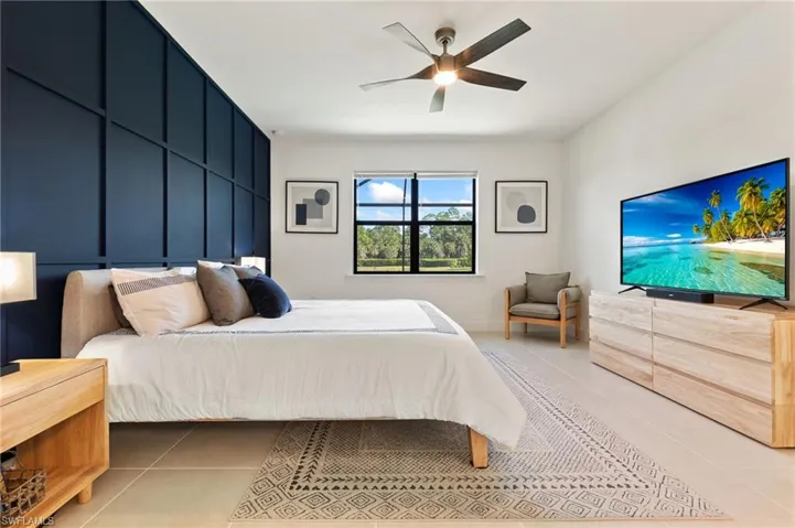 Bedroom featuring ceiling fan