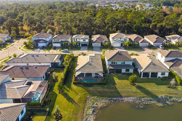Aerial view of residential area with a nearby body of water