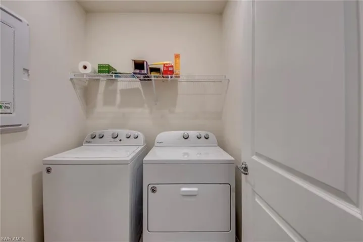 Laundry room with separate washer and dryer