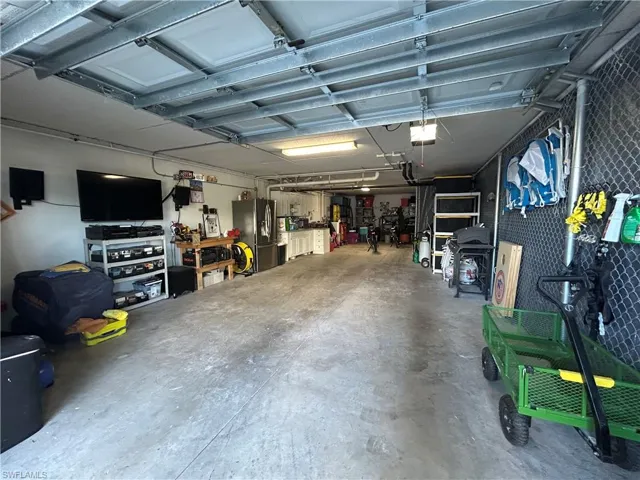 Huge garage can fit boat car and extra storage