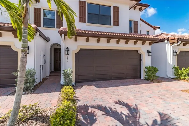 View of front of property with a garage