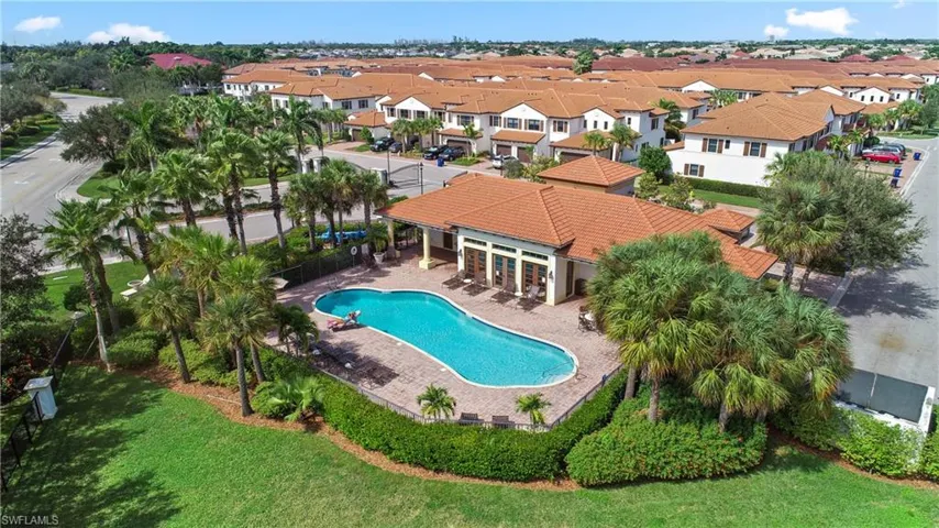 View of pool with a yard and a patio area