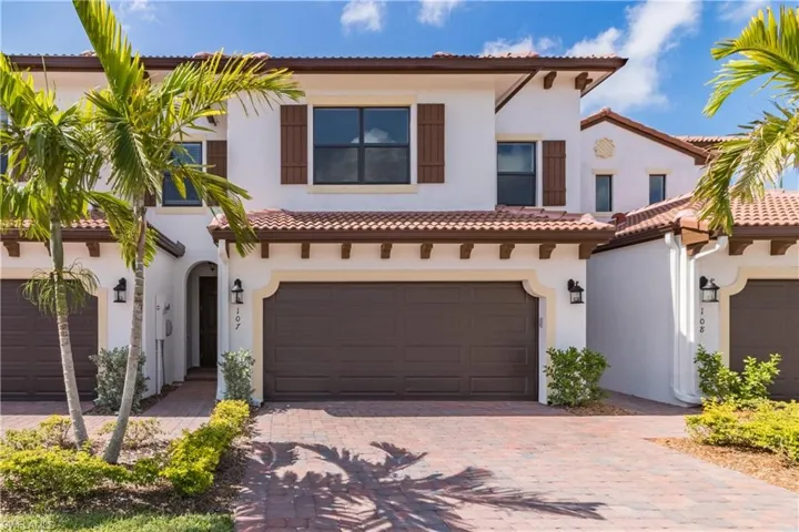 Mediterranean / spanish-style house featuring a garage