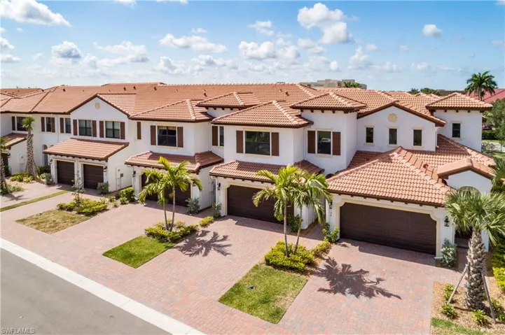 Mediterranean / spanish-style home featuring a garage
