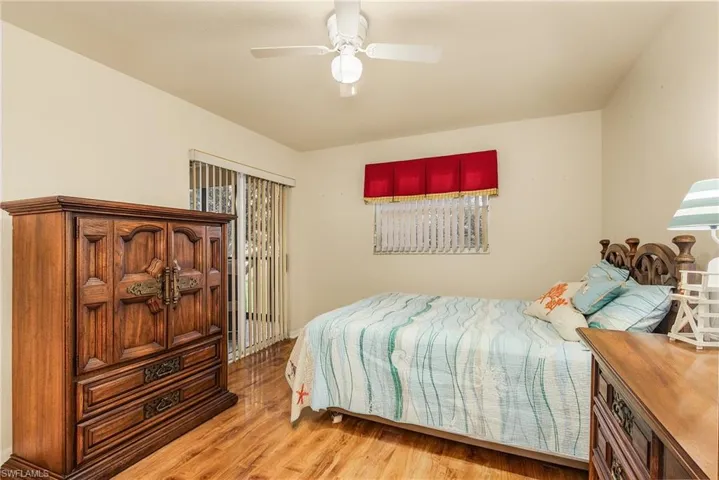 Bedroom featuring light wood-style floors and a ceiling fan