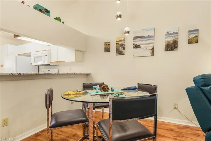 Dining room featuring baseboards and light wood-style floors