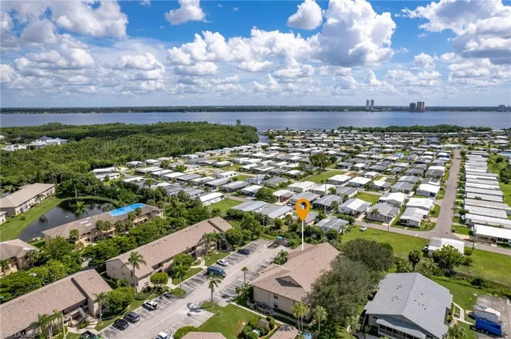 Aerial view of residential area with a nearby body of water