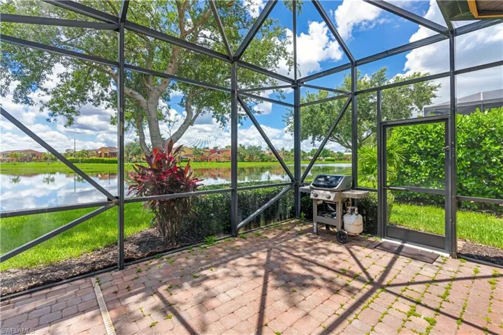 Unfurnished sunroom with a water view