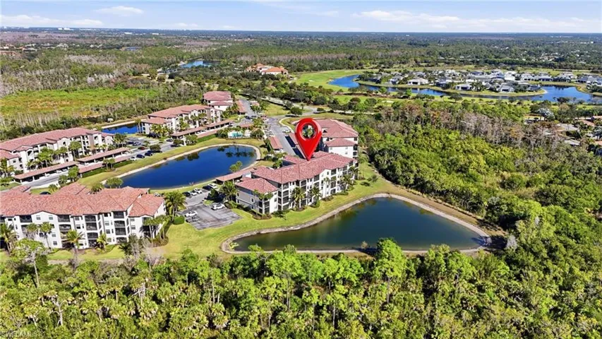 View of property location with a nearby body of water