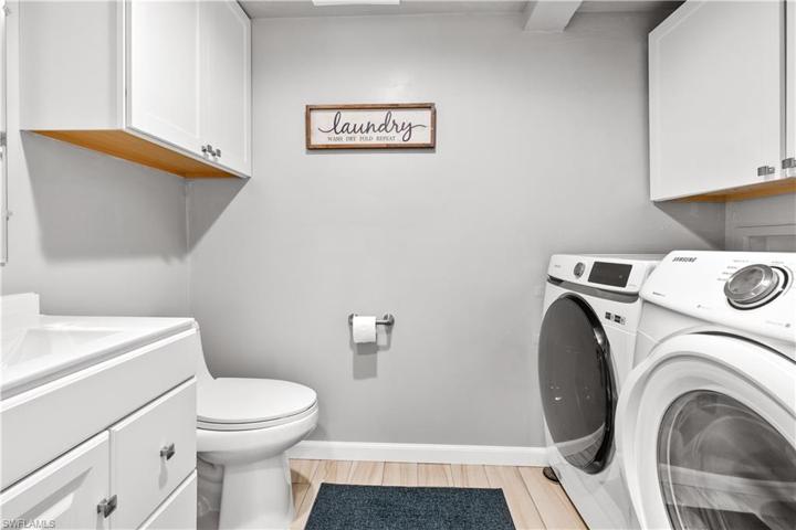 Down stair 1/2 bath with laundry