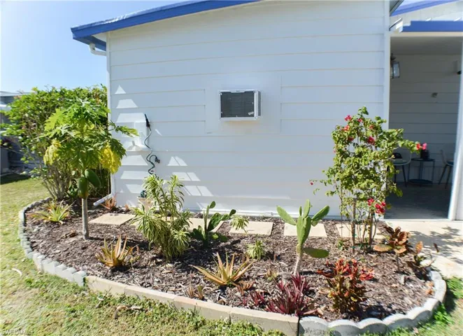 Rear view with beautiful landscaping