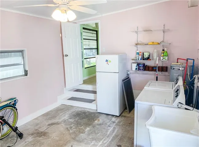 Utility Room with washer, dryer and utility sinkv