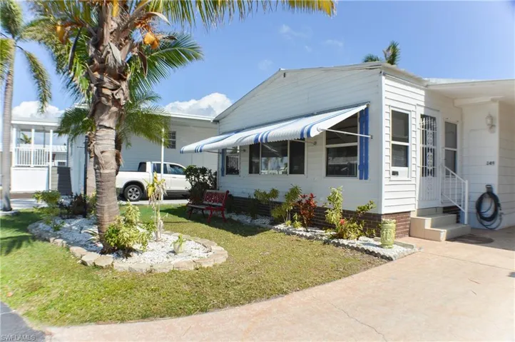 Front view with beautiful landscaping