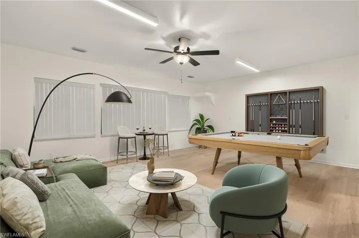 Virtual Staging Rec room with ceiling fan, light wood-type flooring, and billiards