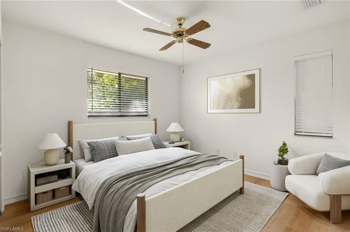 Virtual Staging Bedroom with light hardwood / wood-style floors and ceiling fan
