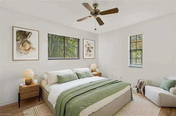 Virtual Staging Bedroom featuring light hardwood / wood-style flooring and ceiling fan