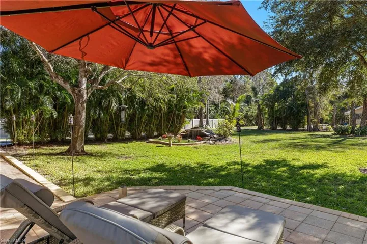 View of yard with a patio area