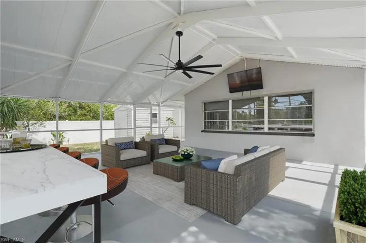 View of patio / terrace featuring ceiling fan and an outdoor living space