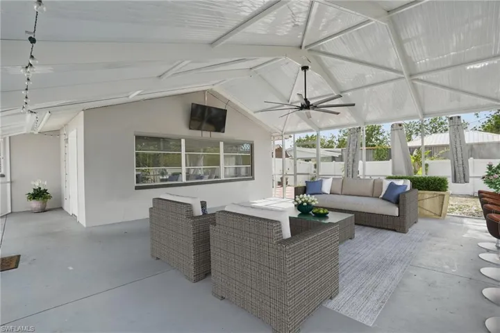 View of patio / terrace featuring a ceiling fan and an outdoor hangout area