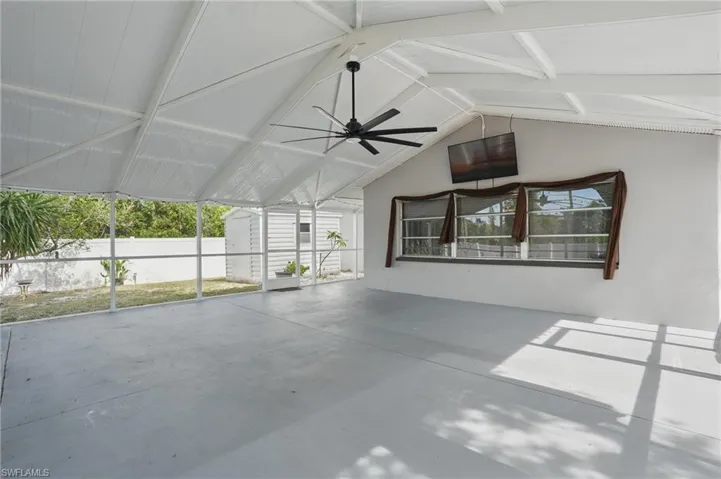 View of patio with a ceiling fan