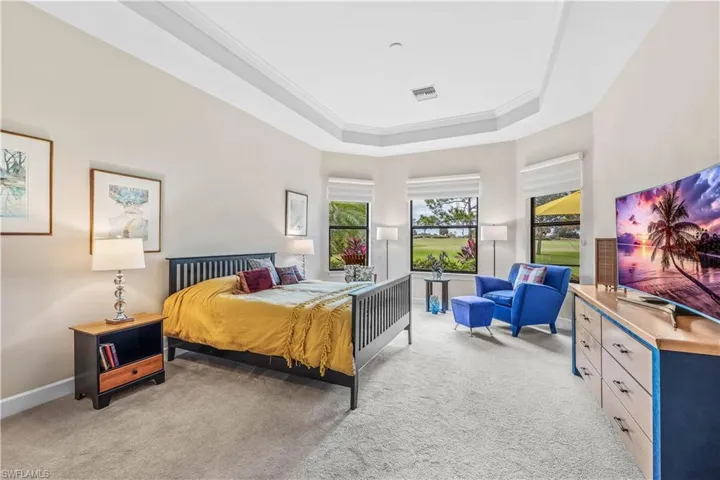Primary Suite with Raised Ceiling and Spectacular Views from the Bay Window!