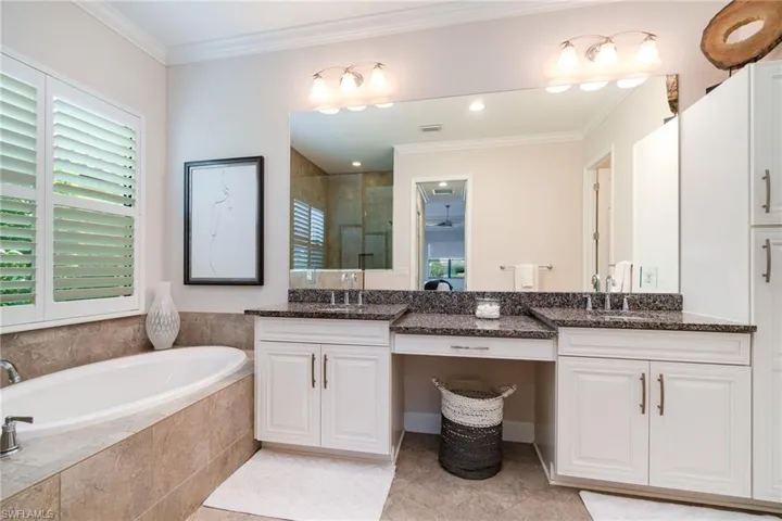 Primary bath has soaking tub, separate shower and double vanities with plenty of storage space!