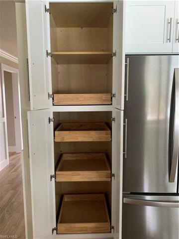 Pantry has Pull Out Shelves.
