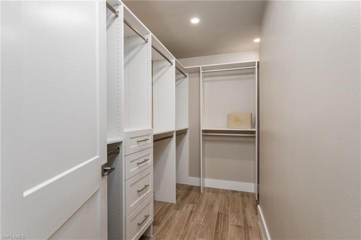 CUSTOM Closet in Primary Bedroom.