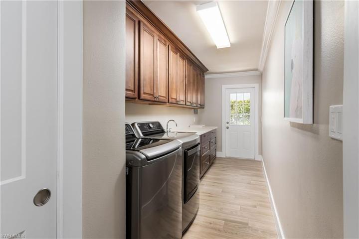 Laundry Room is Massive with tons of storage.