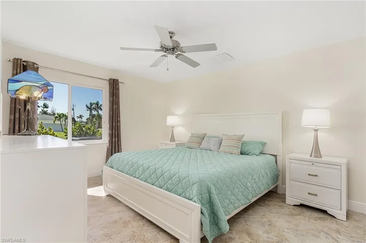 The guest bedroom #2 is bright and large enough for this king size bed.