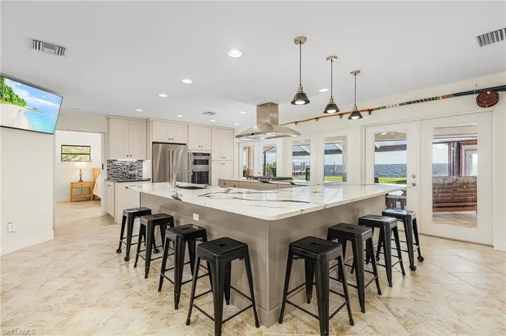 Lovely all new kitchen with quartz counters, gas cooktop and views of Matlacha Pass.