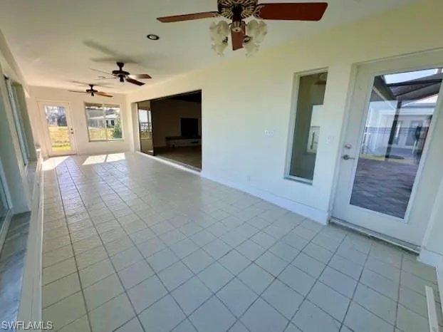 Sunroom has pocket sliders into the Great Room for privacy.